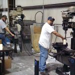 Employees Marco Chavez & Jason Plunkett producing conventional milling.