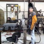 Jason Guest welding some production parts